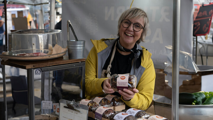 Woman selling bread at farmers market